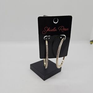 New on card Shiela Rose gold tone oval hoop earrings with rhinestones